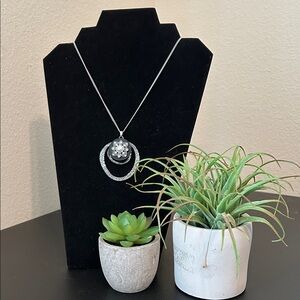 Elegant Silver Necklace with Black Pendant